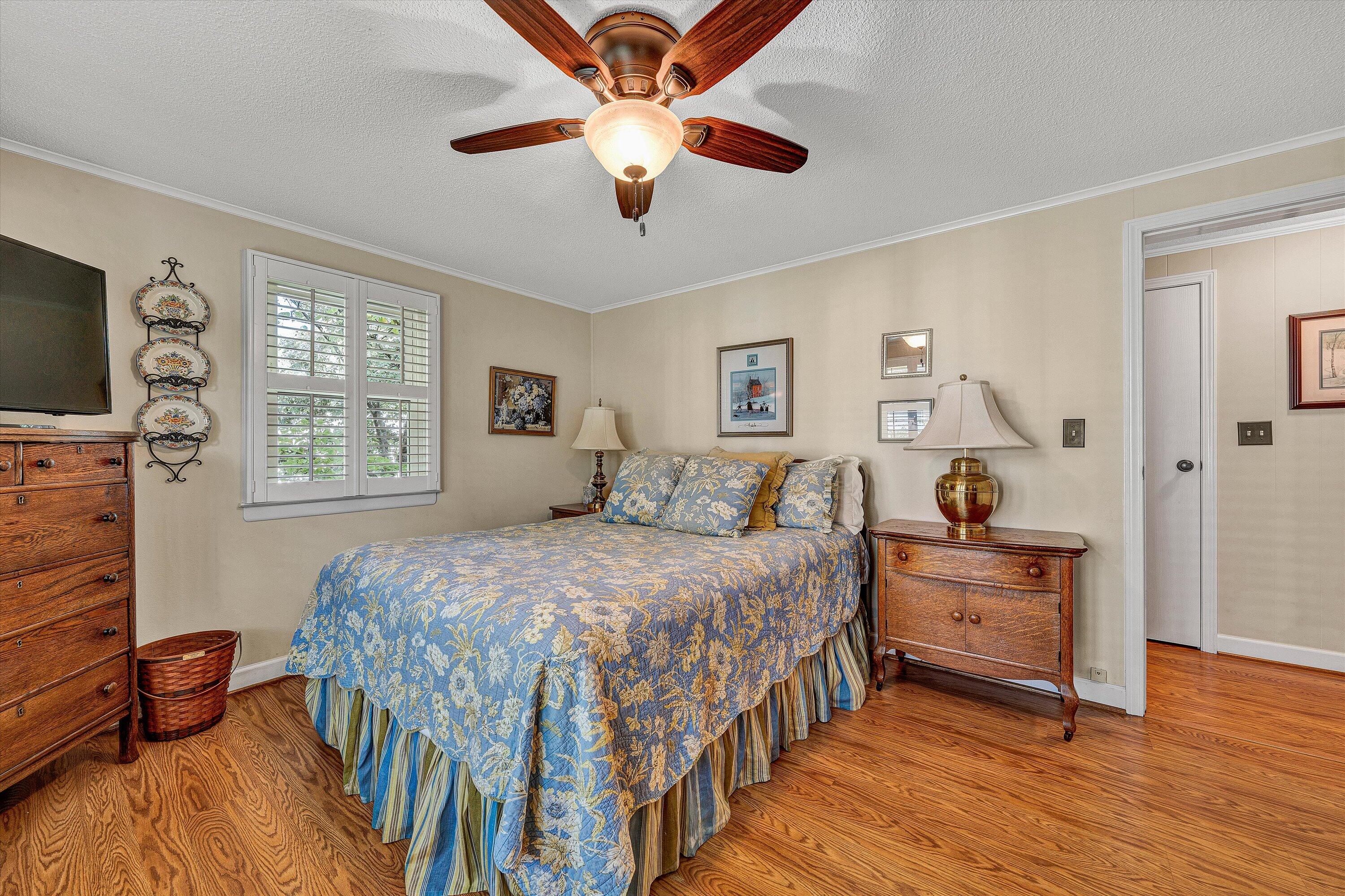 151 Twin Oaks Road Wirtz, VA 24184 - Photo 24 of 41 a bedroom with a bed and a flat screen tv