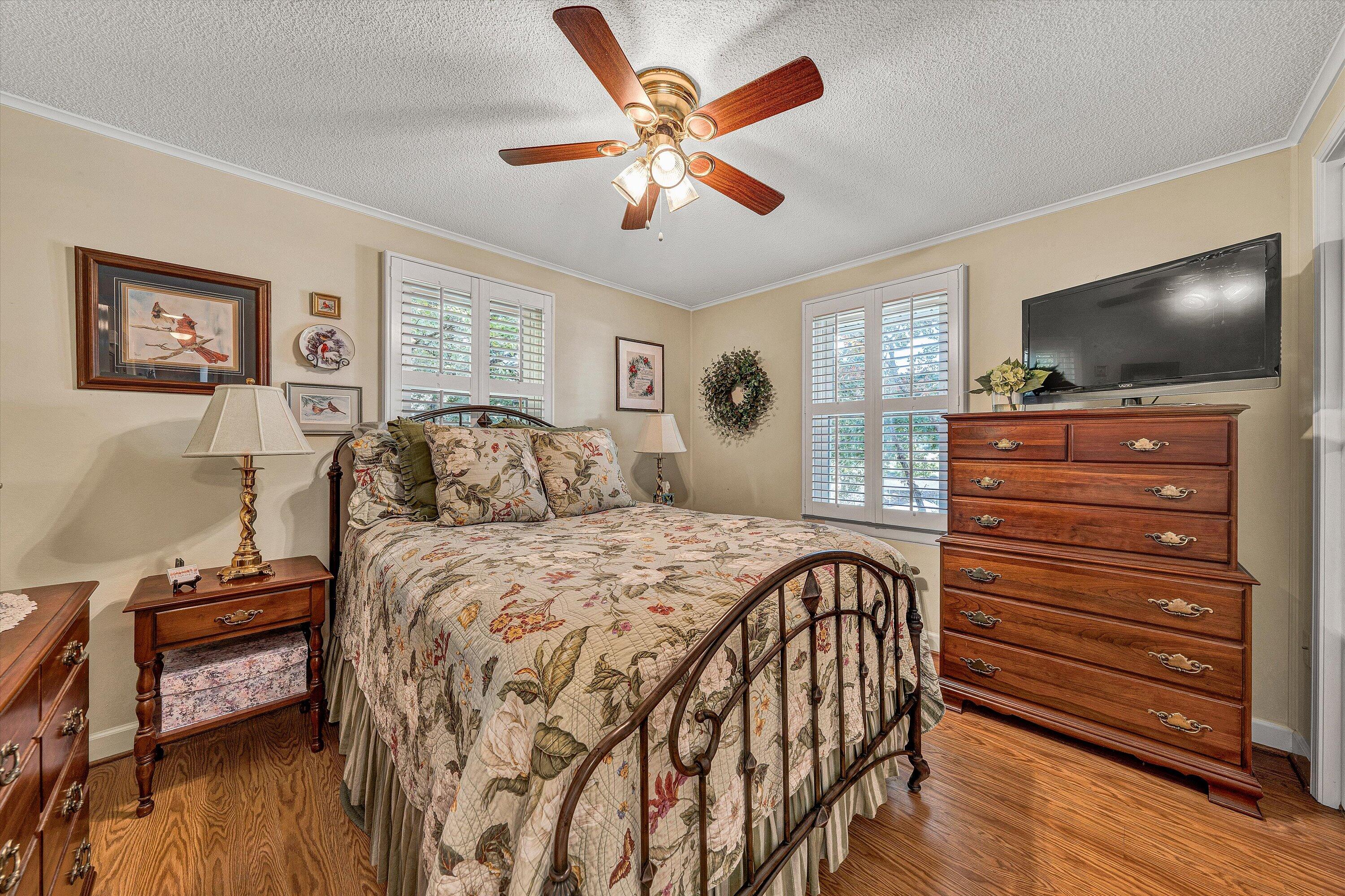 151 Twin Oaks Road Wirtz, VA 24184 - Photo 26 of 41 a bedroom with a bed and a flat screen tv