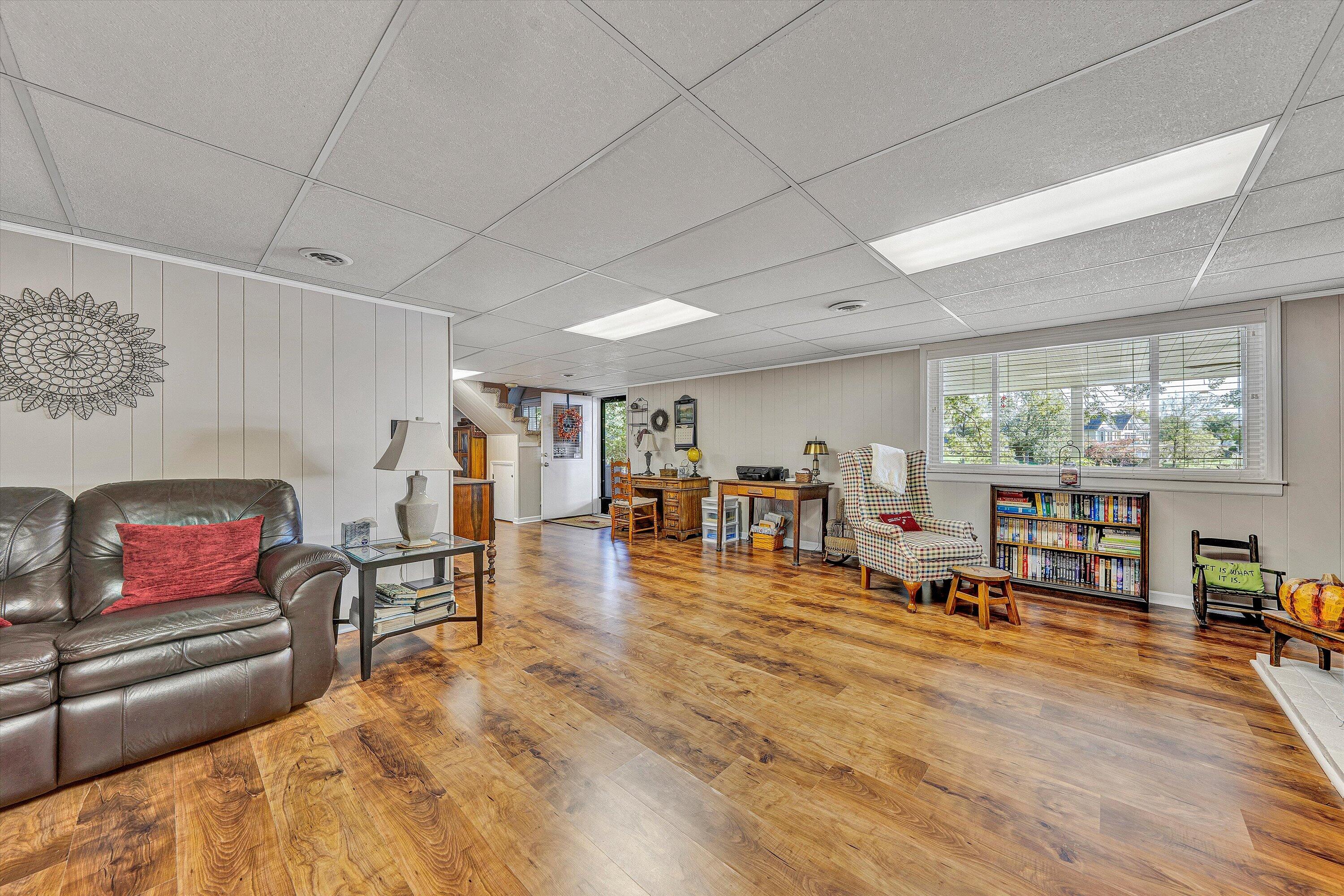 151 Twin Oaks Road Wirtz, VA 24184 - Photo 31 of 41 a living room with furniture and a large window