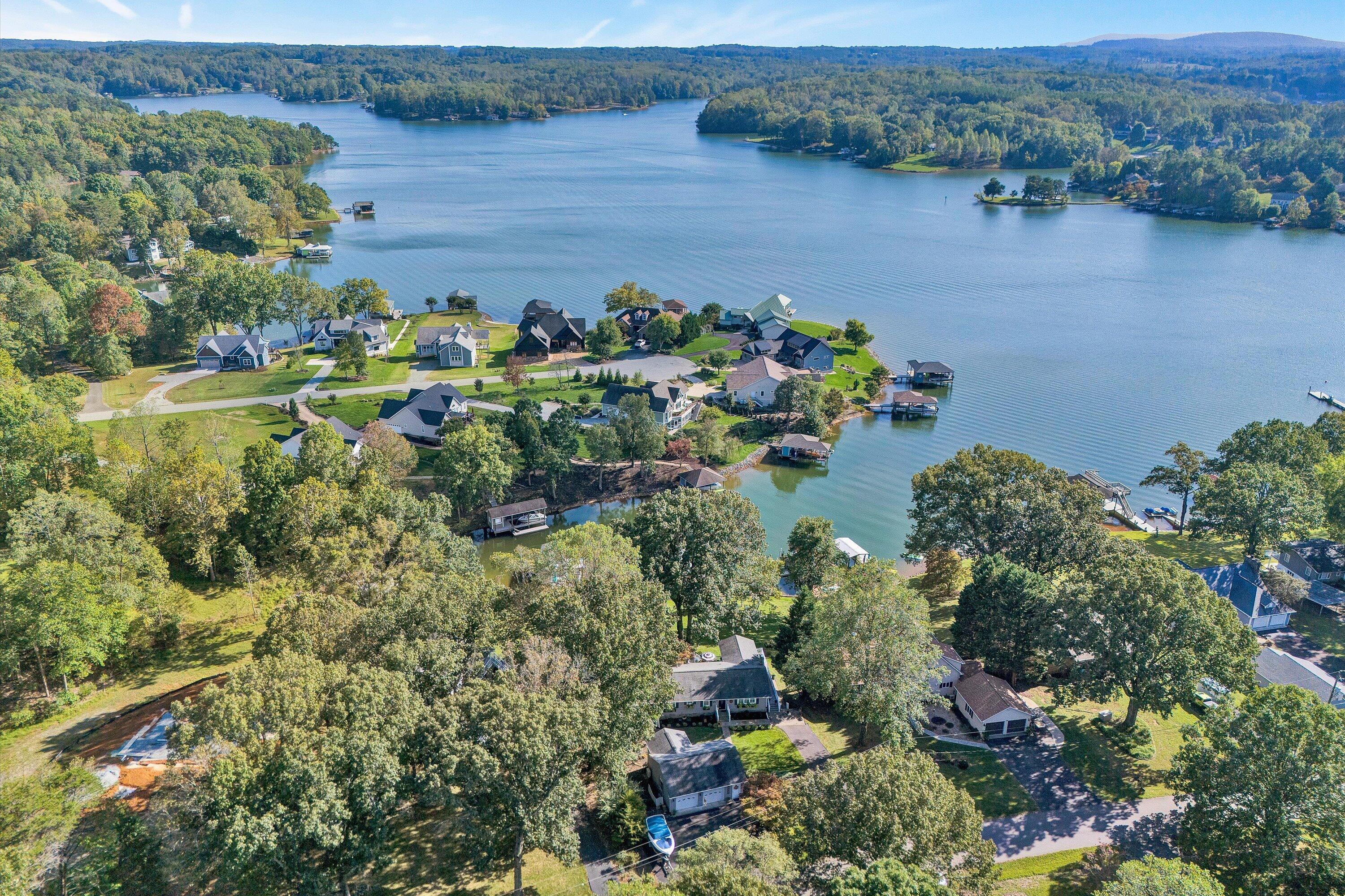 151 Twin Oaks Road Wirtz, VA 24184 - Photo 39 of 41 an aerial view of a houses with outdoor space and lake view
