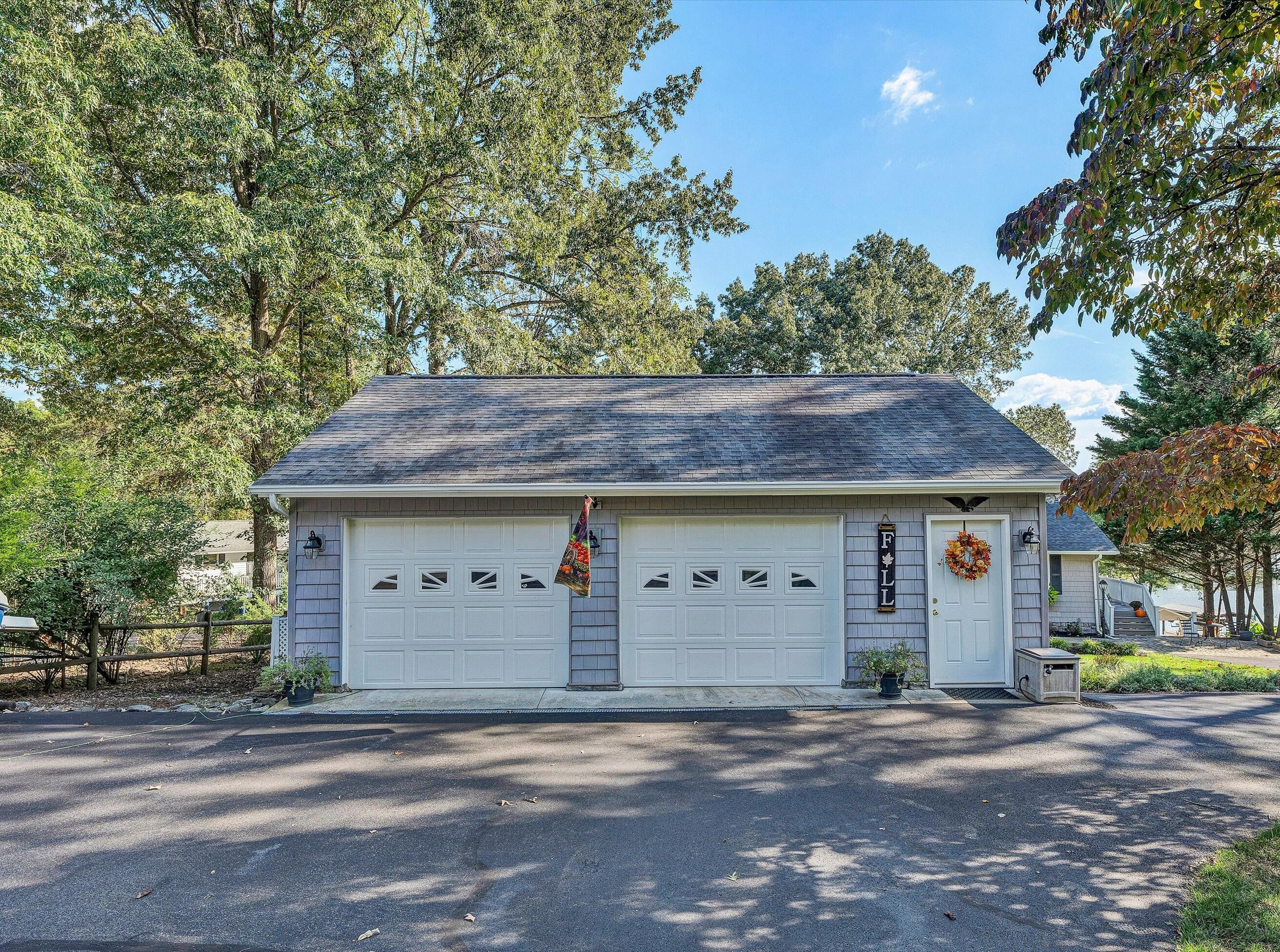 151 Twin Oaks Road Wirtz, VA 24184 - Photo 4 of 41 a front view of a house with a space