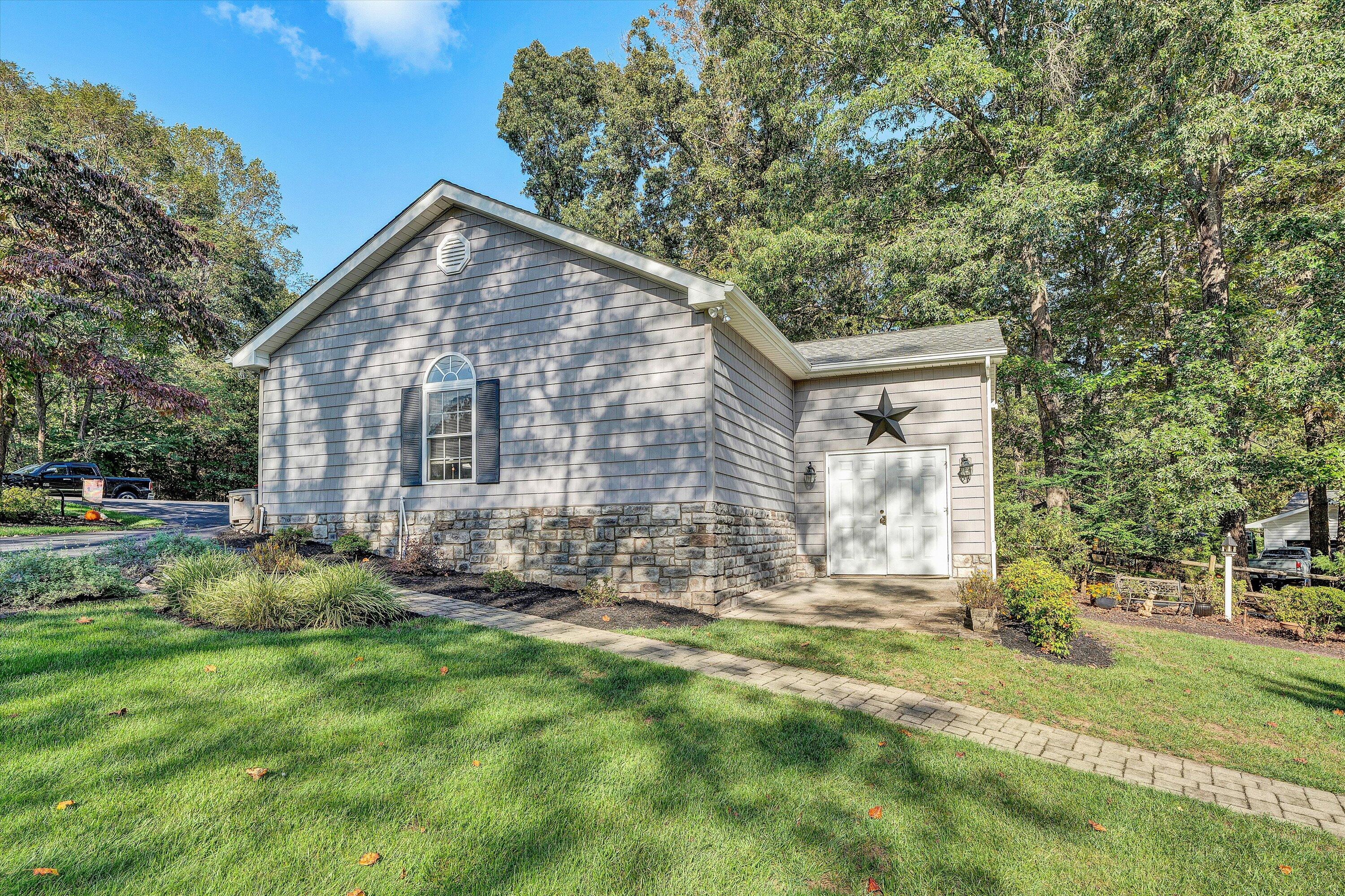 151 Twin Oaks Road Wirtz, VA 24184 - Photo 5 of 41 a view of a house with a yard