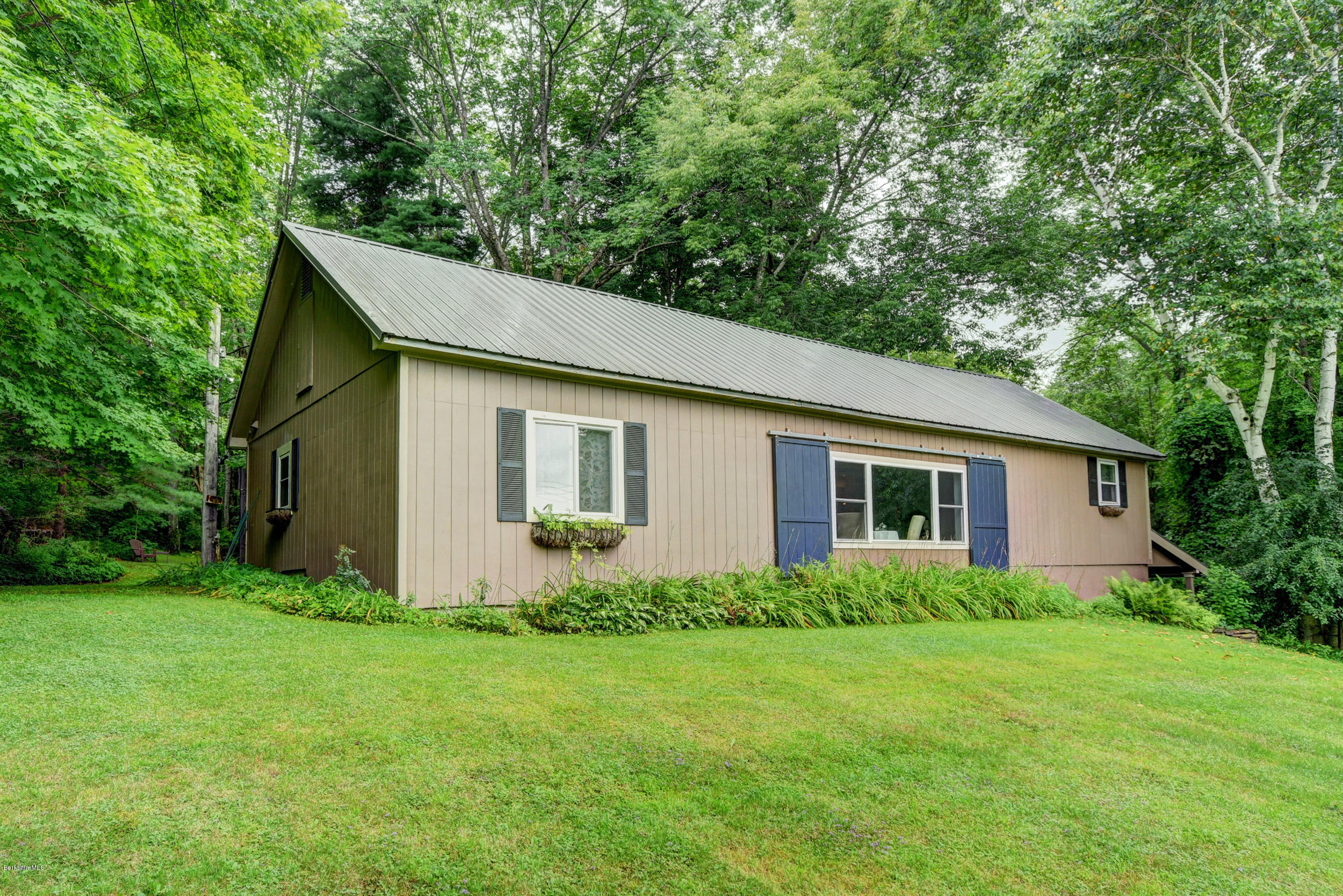 57 State Line Road West Stockbridge, MA 01266 - Photo 1 of 21 a view of a house with backyard and garden