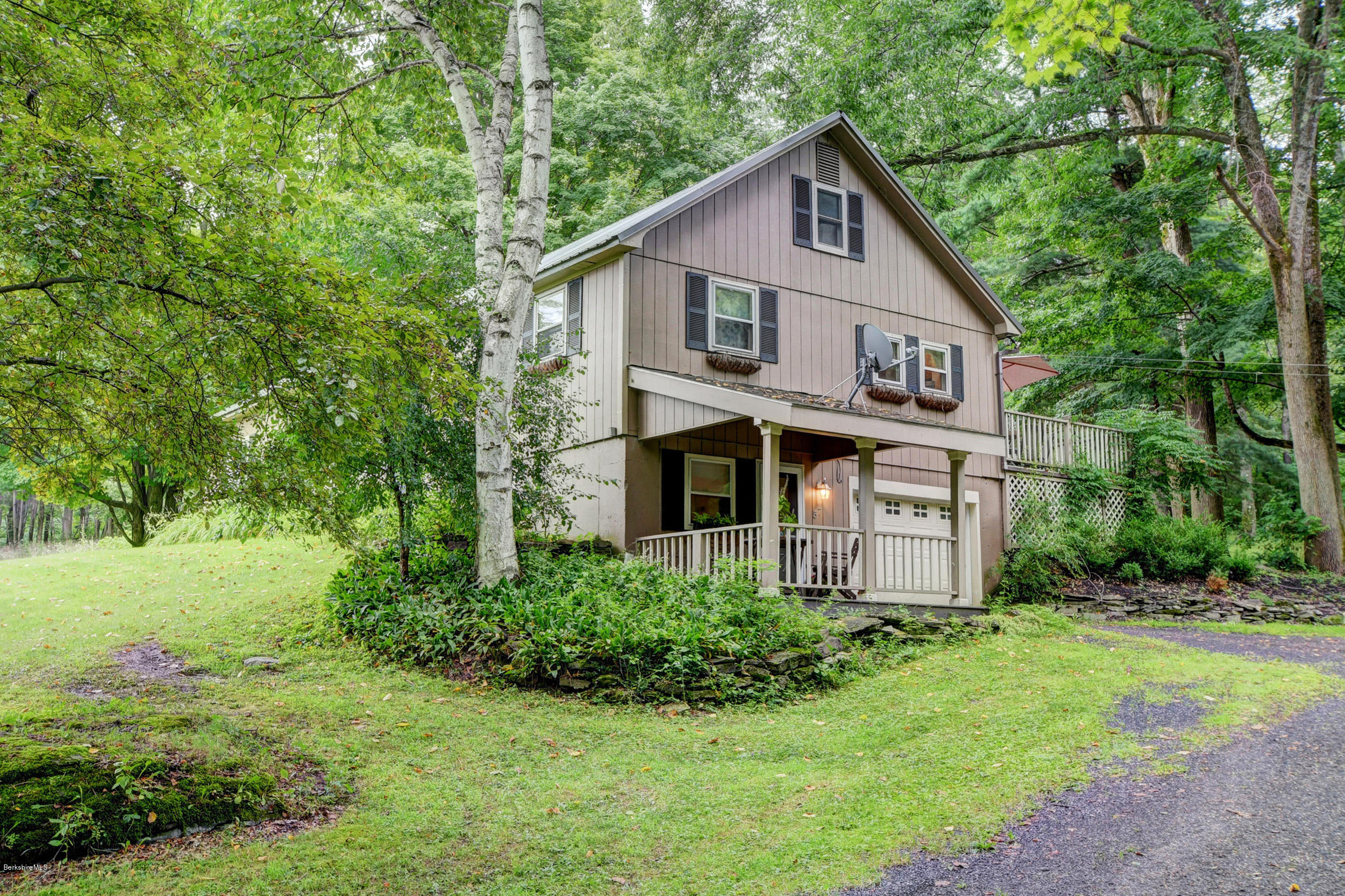 57 State Line Road West Stockbridge, MA 01266 - Photo 2 of 21 a front view of a house with a yard