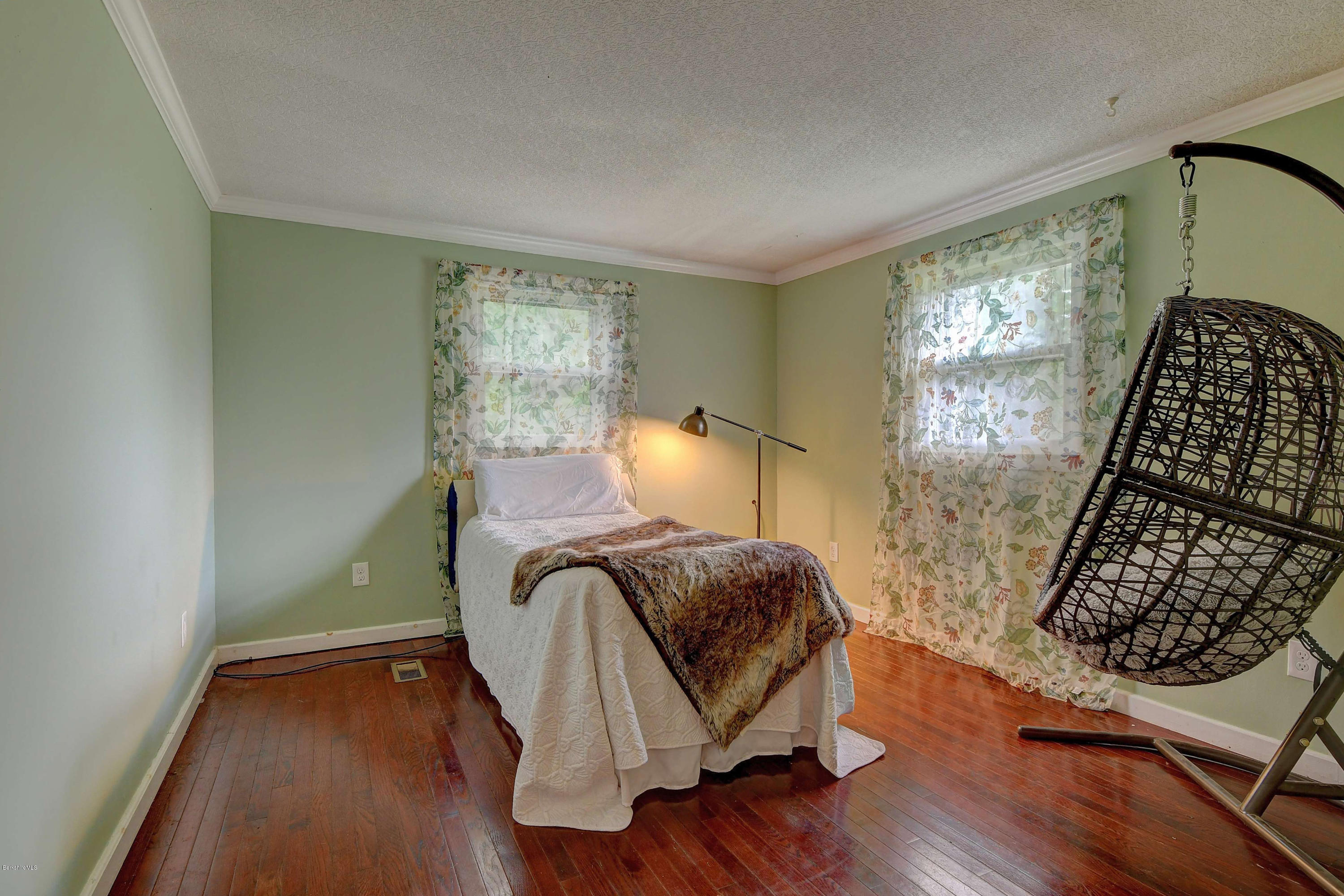 57 State Line Road West Stockbridge, MA 01266 - Photo 13 of 21 a bedroom with a bed and wooden floor