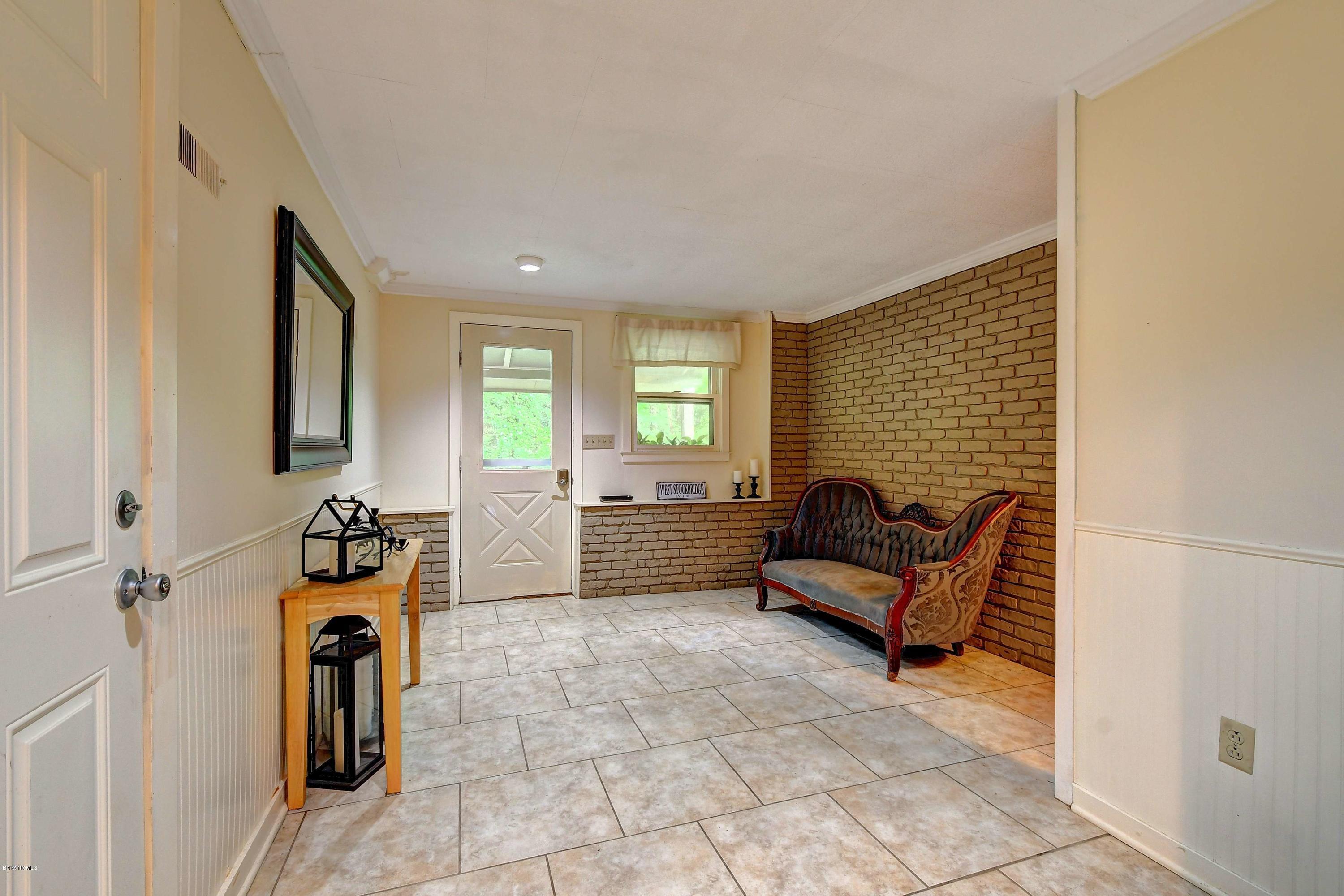 57 State Line Road West Stockbridge, MA 01266 - Photo 16 of 21 a living room with furniture and a window