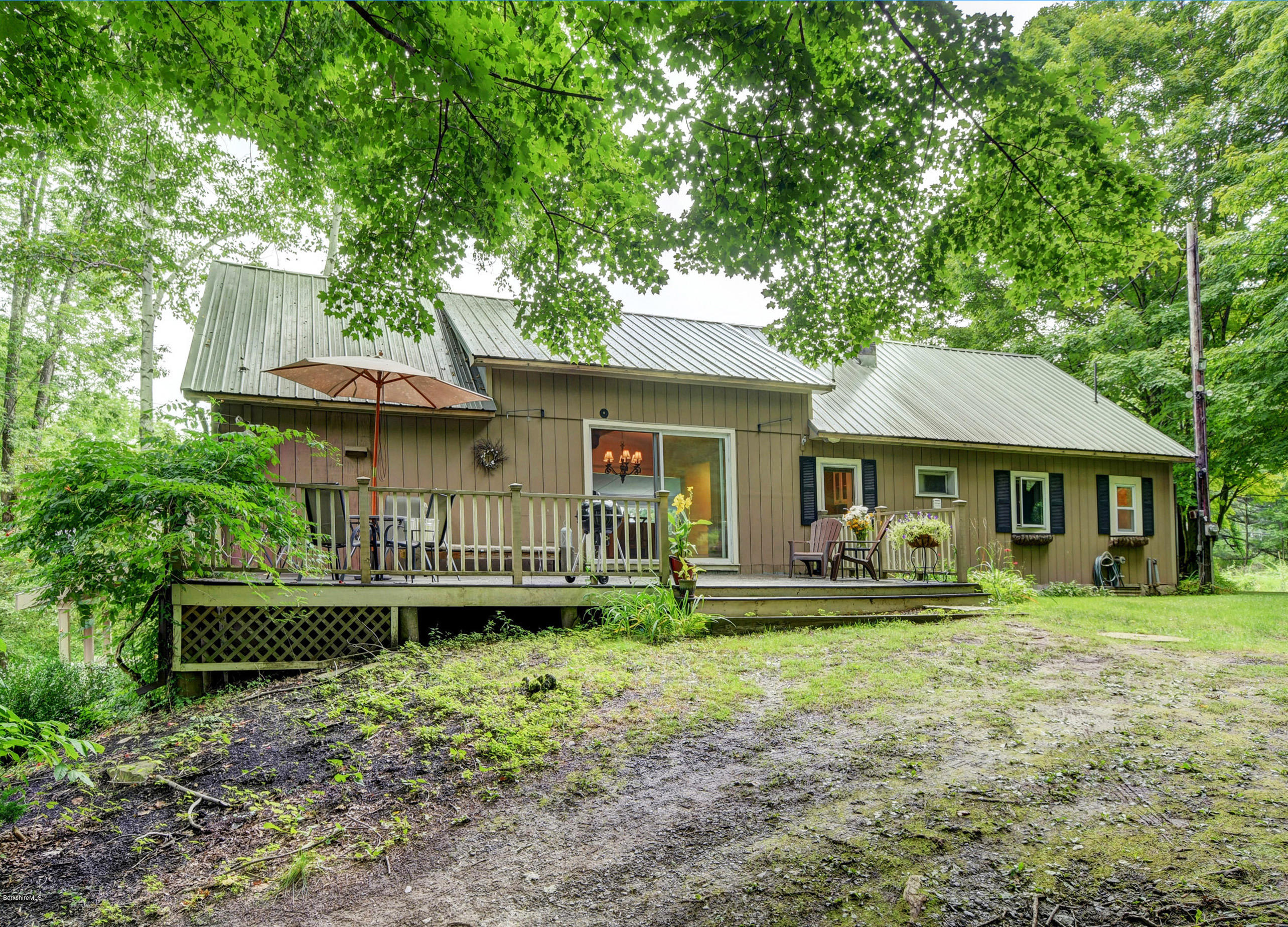 57 State Line Road West Stockbridge, MA 01266 - Photo 17 of 21 a front view of a house with garden