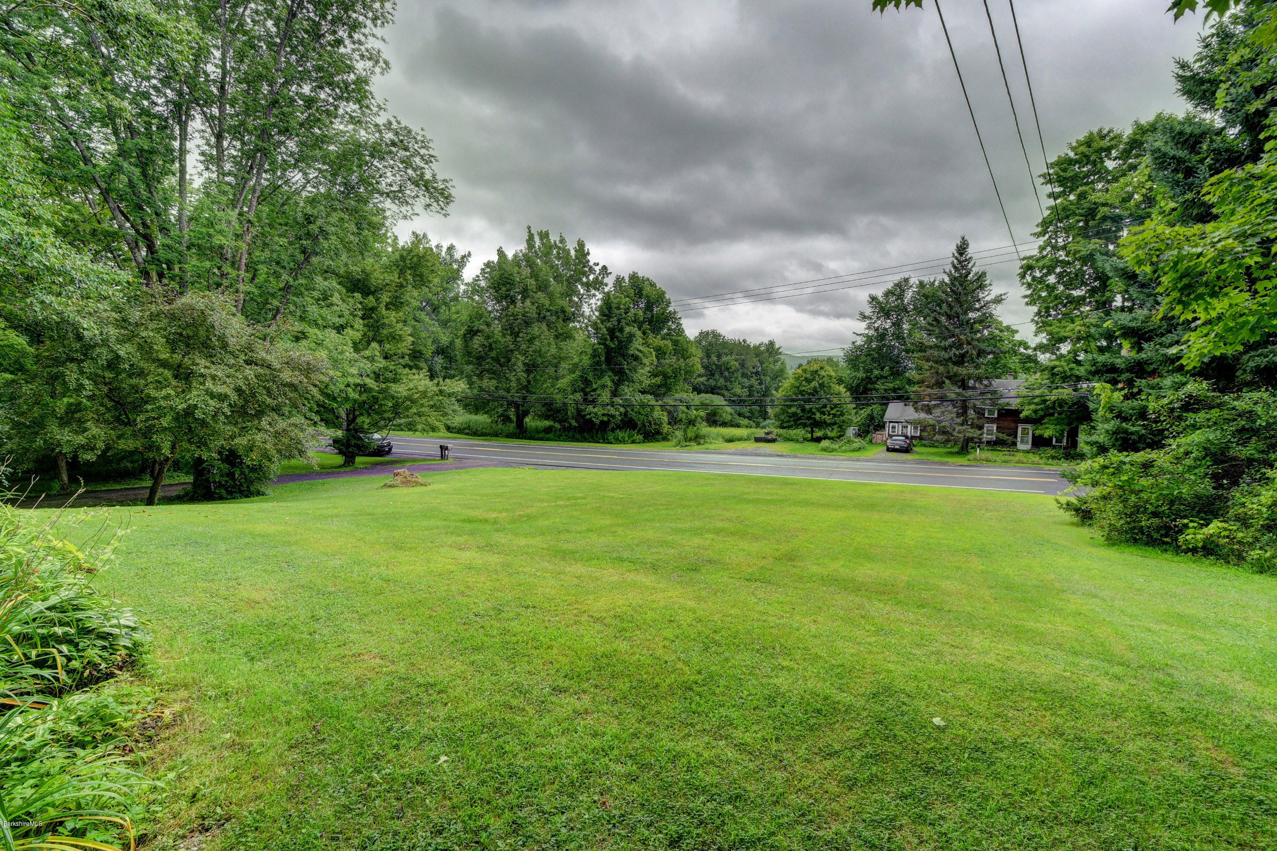 57 State Line Road West Stockbridge, MA 01266 - Photo 20 of 21 a view of a field of grass and trees
