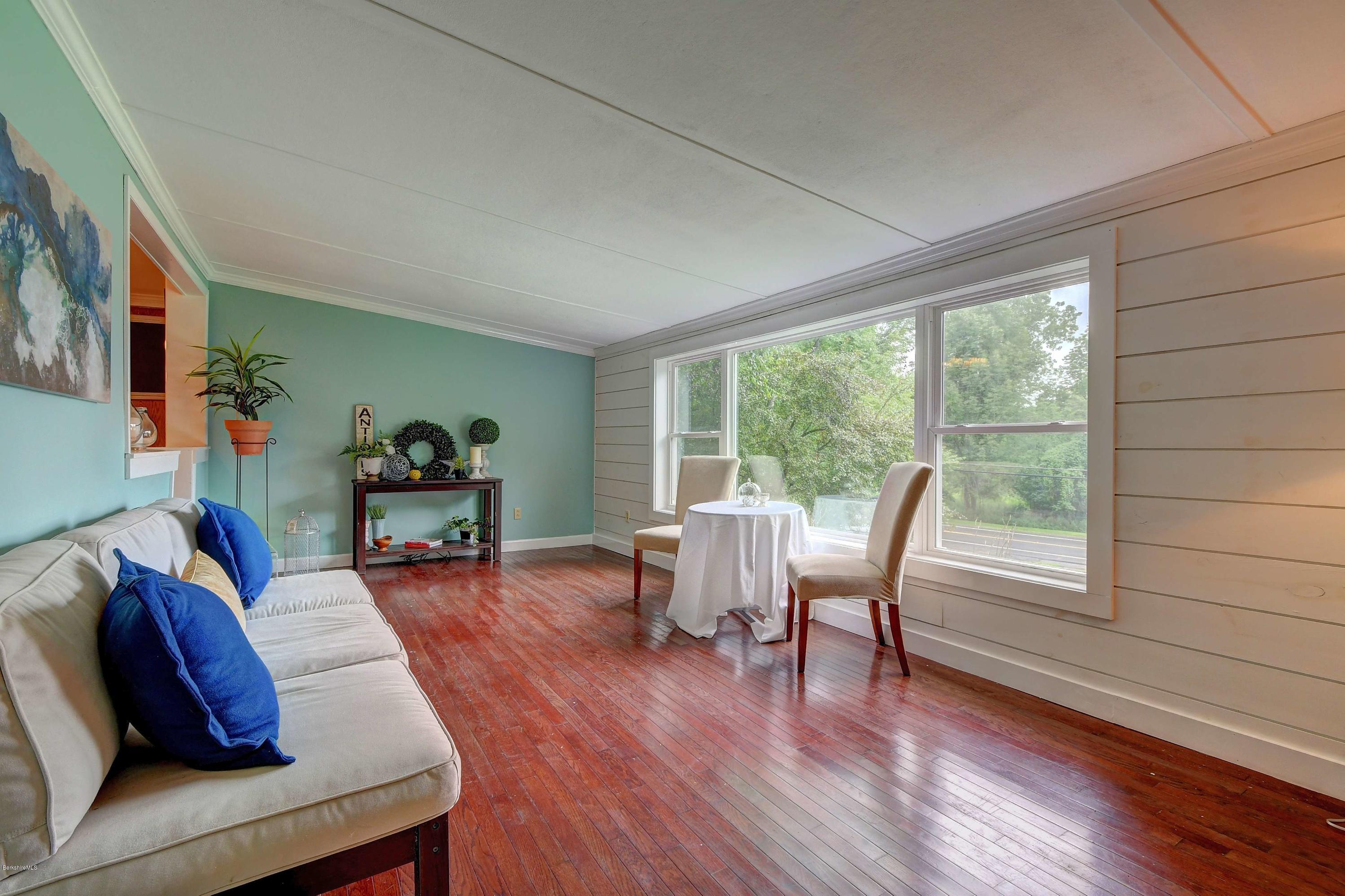 57 State Line Road West Stockbridge, MA 01266 - Photo 4 of 21 a living room with furniture and a wooden floor