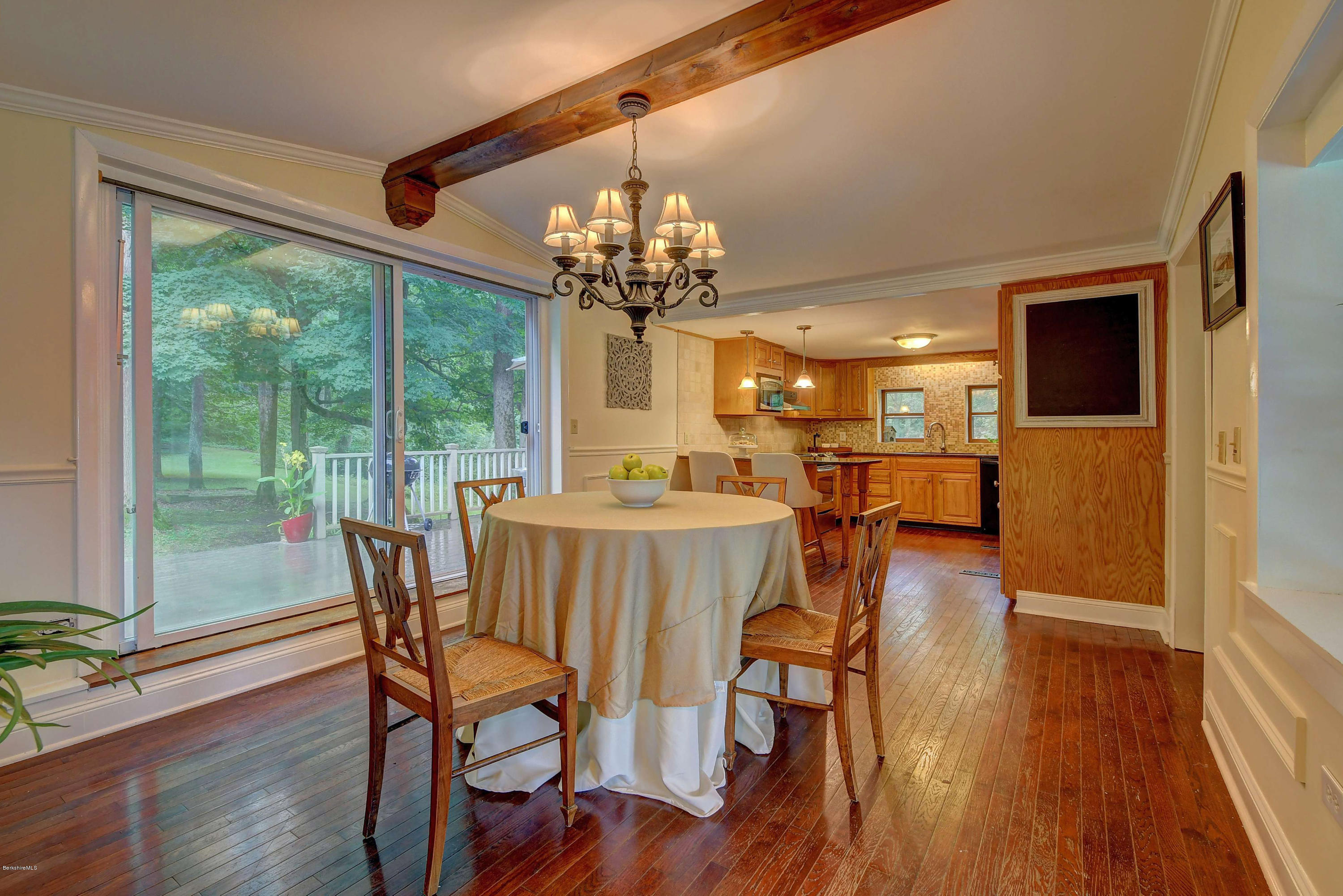 57 State Line Road West Stockbridge, MA 01266 - Photo 6 of 21 a view of a dining room with furniture wooden floor and chandelier