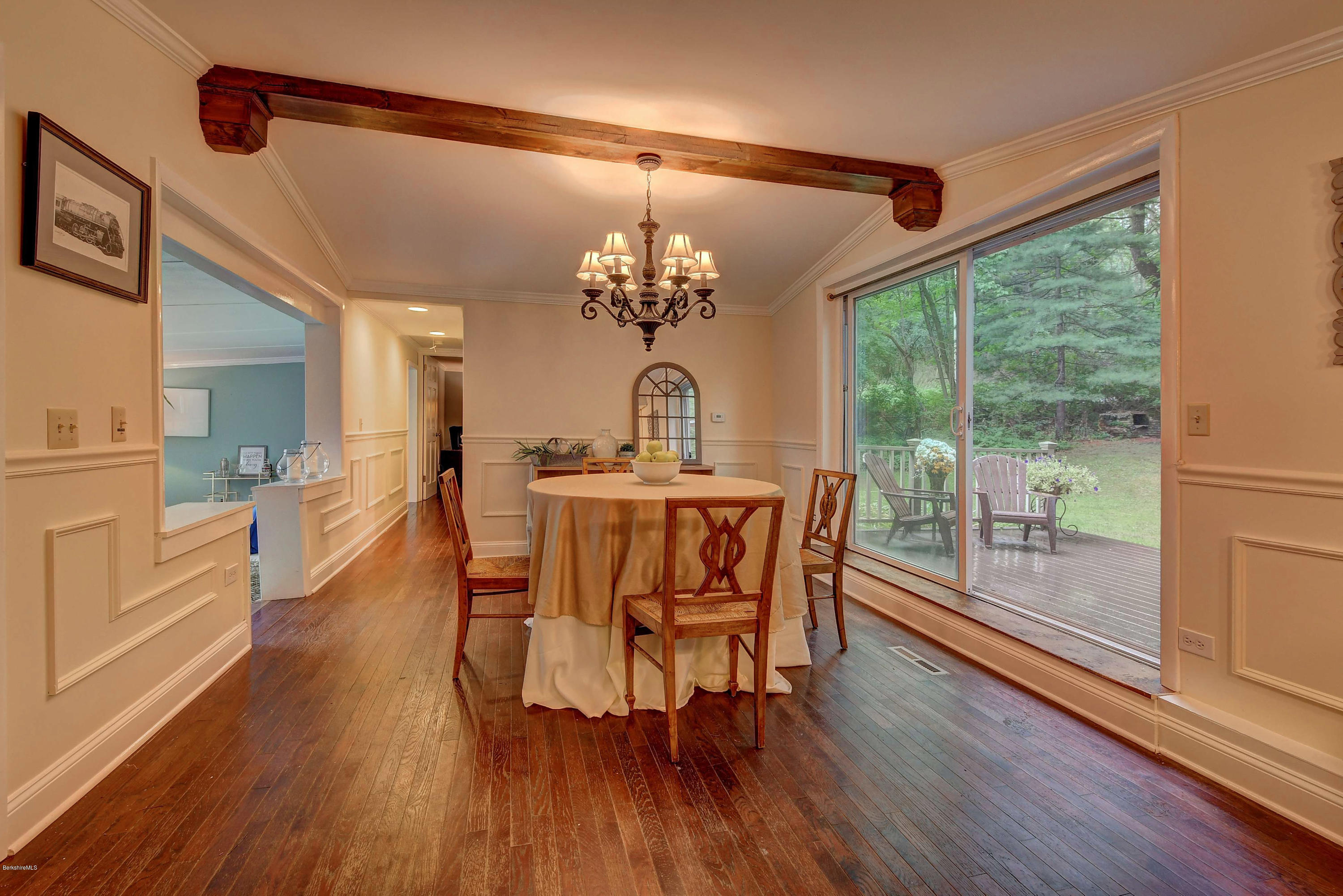 57 State Line Road West Stockbridge, MA 01266 - Photo 9 of 21 a dining room with furniture a chandelier and wooden floor