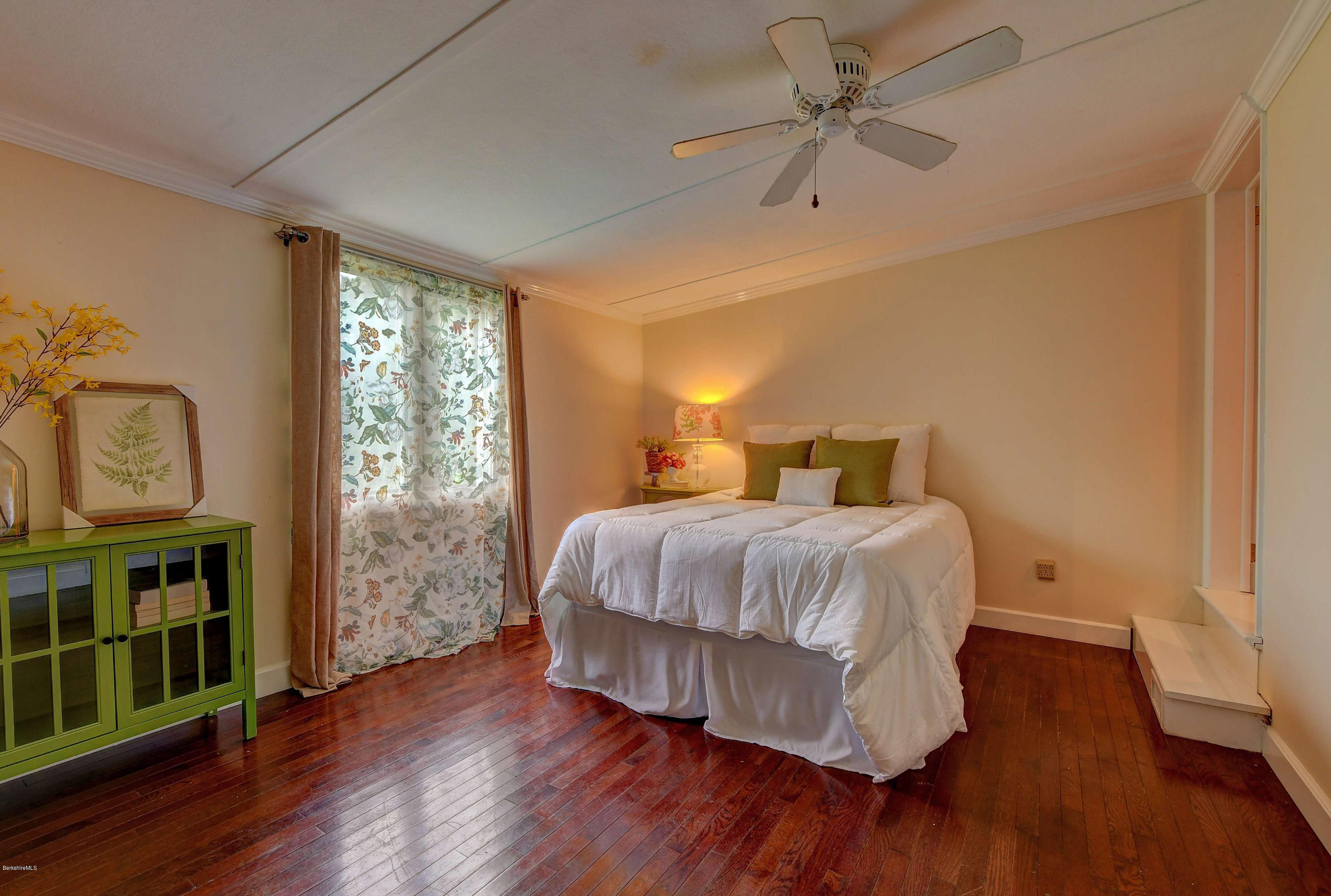 57 State Line Road West Stockbridge, MA 01266 - Photo 10 of 21 a bedroom with a bed and wooden floor