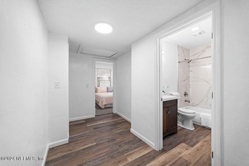 1720 Lilly Road East Jacksonville, FL 32207 - Photo 21 of 33 a bathroom with a sink and a toilet