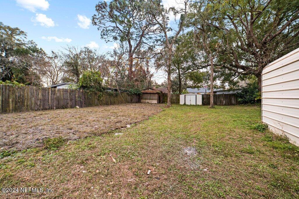 1720 Lilly Road East Jacksonville, FL 32207 - Photo 27 of 33 a view of a house with a yard