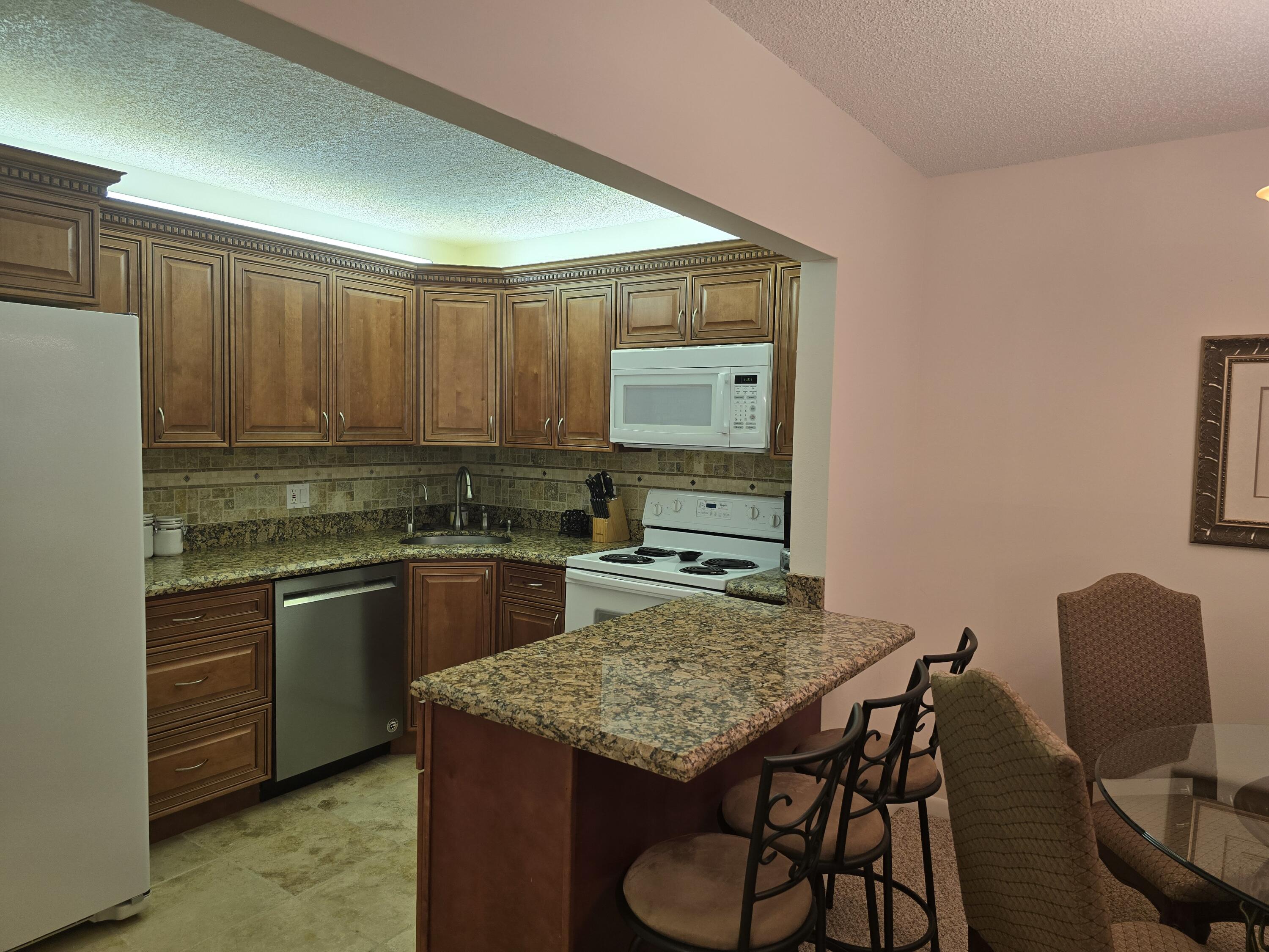 317 Pine Ridge Circle Greenacres, FL 33463 - Photo 5 of 51 kitchen bar
