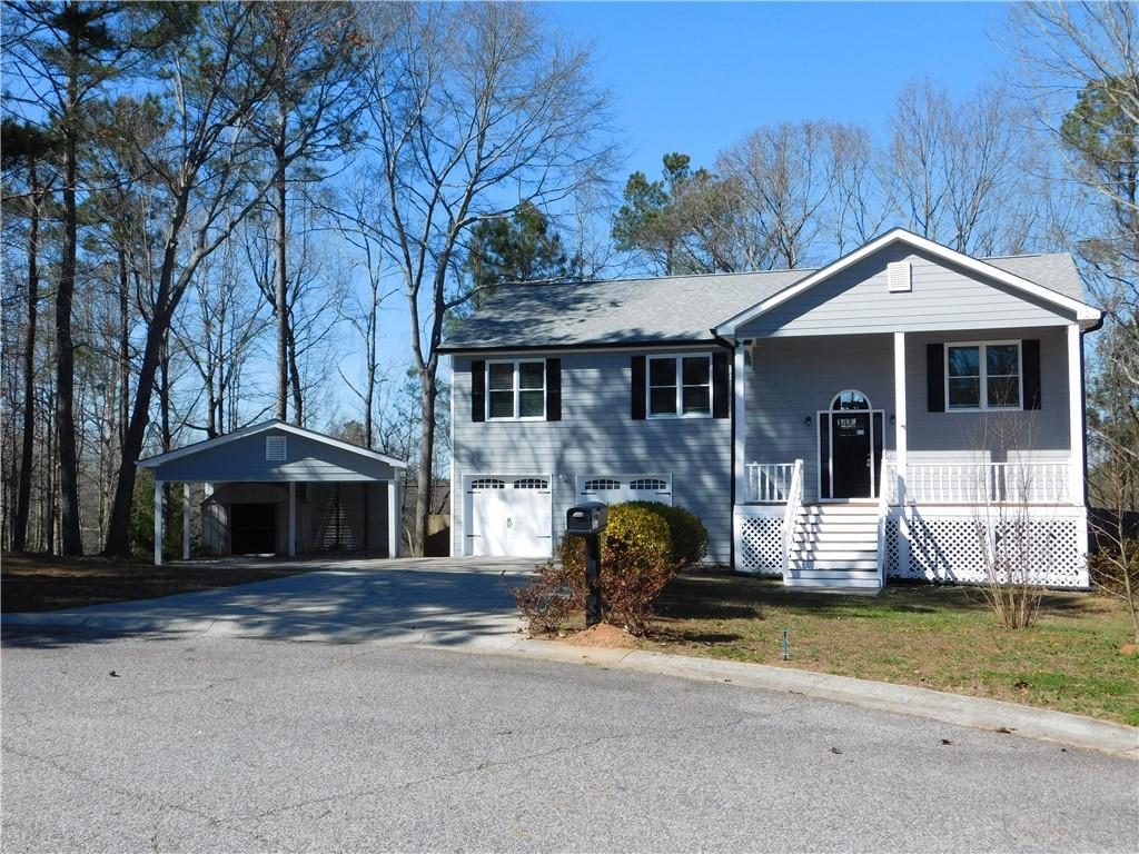 757 Ridgeland Road Bethlehem, GA 30620 - Photo 1 of 1 a front view of a house with a yard