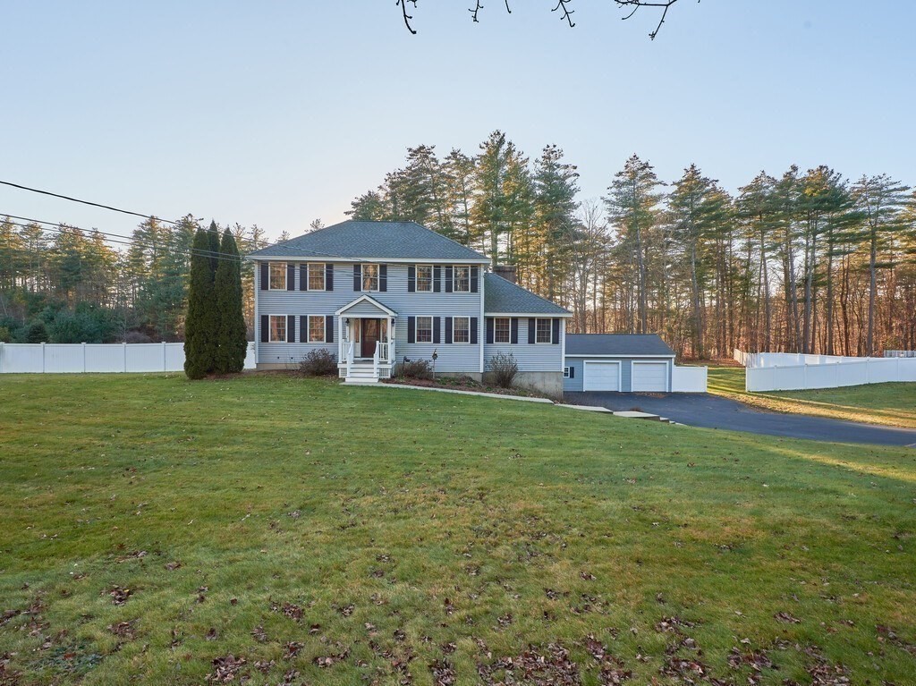 86 Mason Road Townsend, MA 01474 - Photo 1 of 41 a view of a house with a yard porch and sitting area
