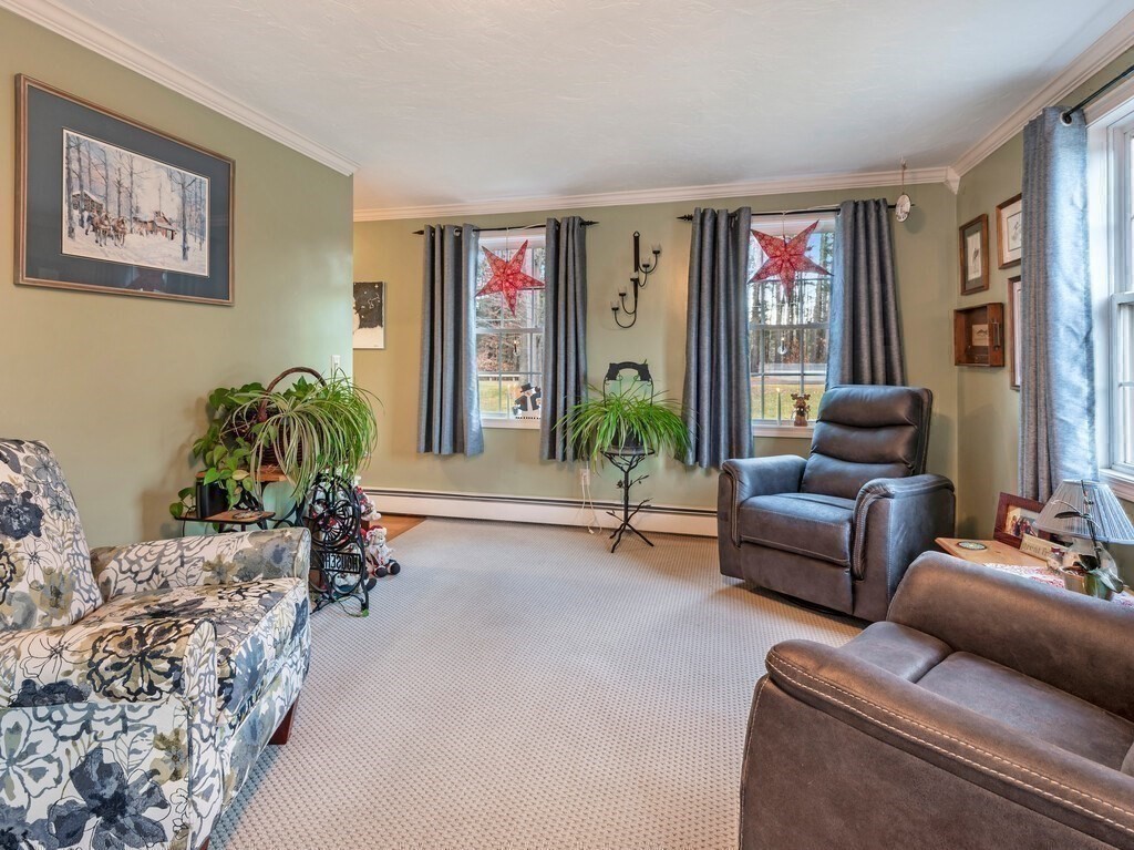 86 Mason Road Townsend, MA 01474 - Photo 18 of 41 a living room with furniture and a potted plant