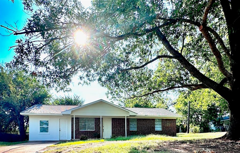 1215 Indiana Street Graham, TX 76450 - Photo 1 of 1 Beautiful home with stellar curb appeal.