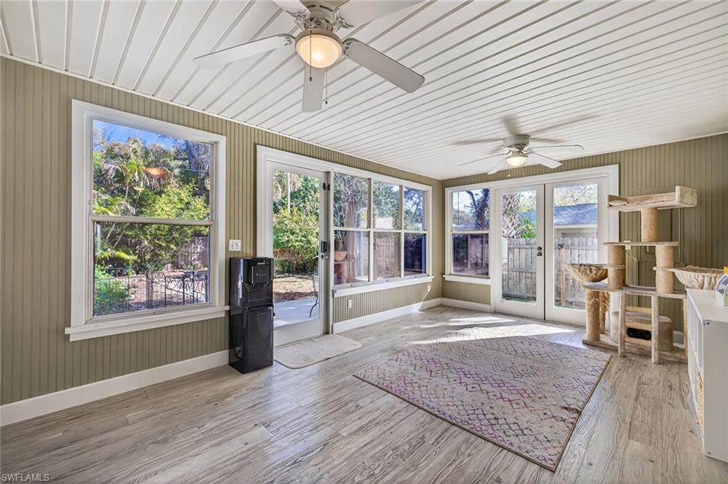 2149 Stella Street Fort Myers, FL 33901 - Photo 27 of 43 a floor to ceiling window and a wooden floor