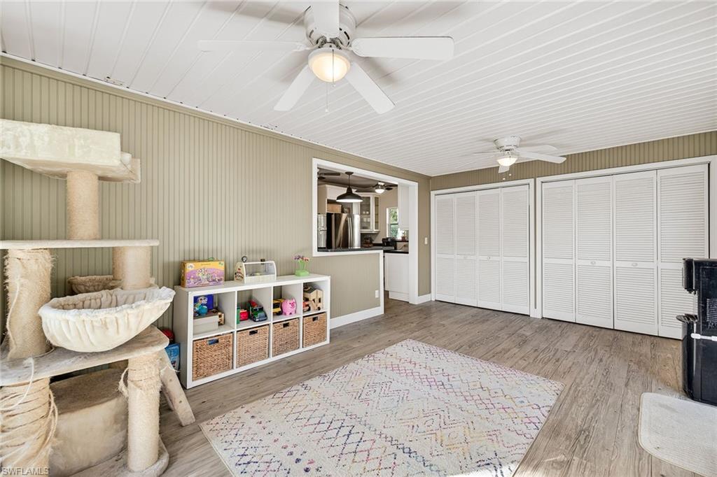 2149 Stella Street Fort Myers, FL 33901 - Photo 29 of 43 a living room with furniture and a wooden floor