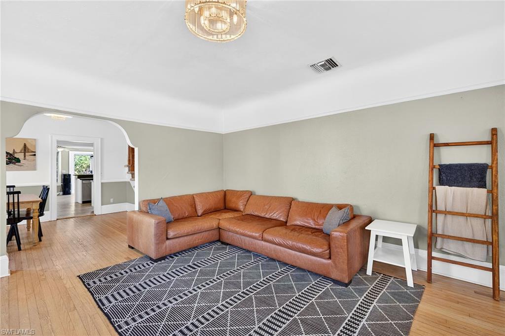2149 Stella Street Fort Myers, FL 33901 - Photo 3 of 43 a living room with furniture and wooden floor