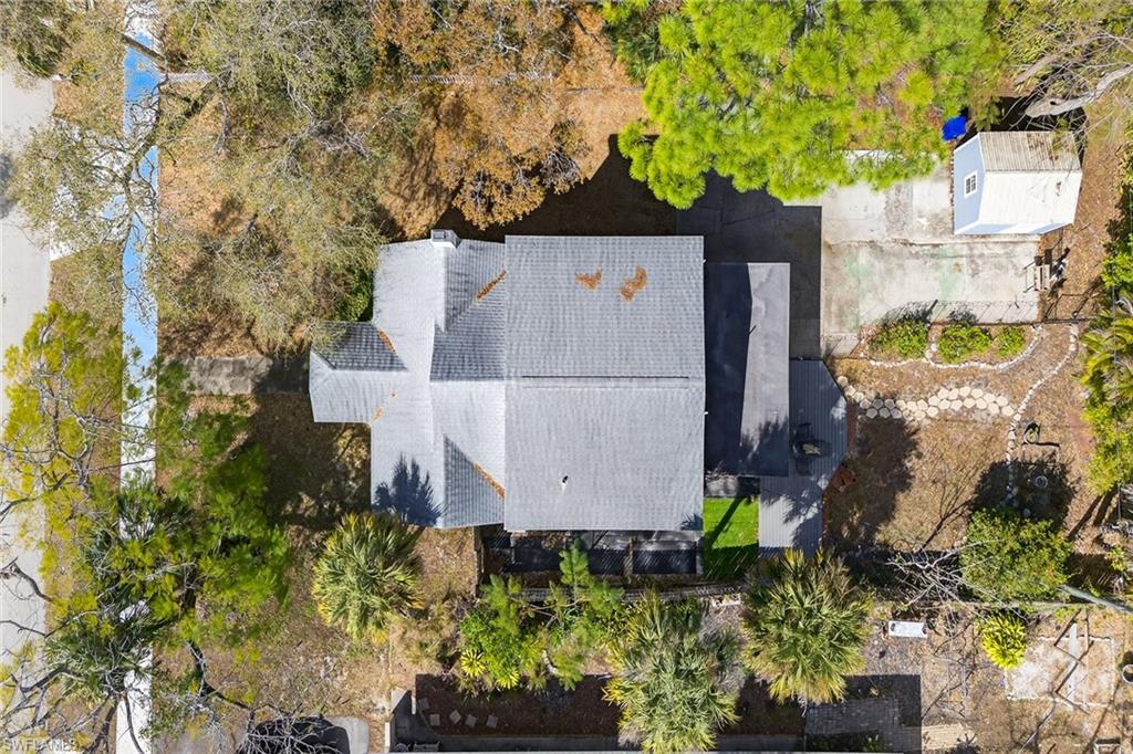 2149 Stella Street Fort Myers, FL 33901 - Photo 42 of 43 an aerial view of a house with a yard and a large tree