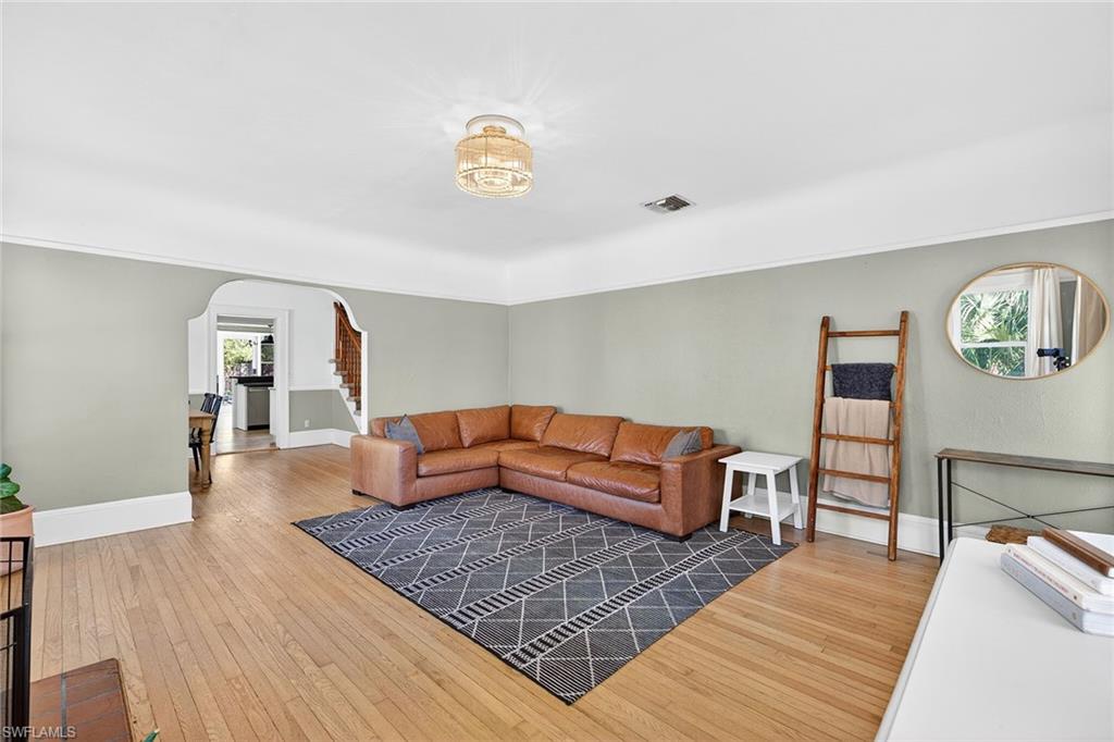 2149 Stella Street Fort Myers, FL 33901 - Photo 6 of 43 a living room with furniture and a wooden floor