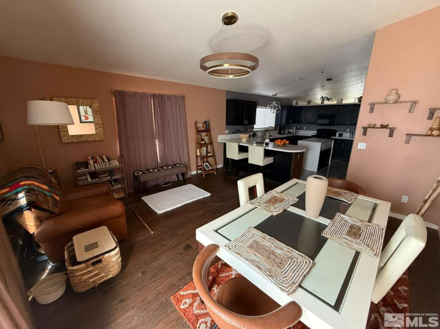 18641 Jutewood Court Reno, NV 89508 - Photo 3 of 12 a living room with furniture and a window