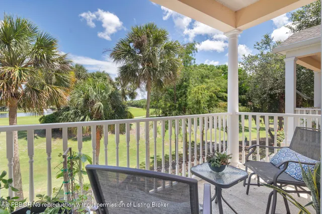 a balcony with chairs