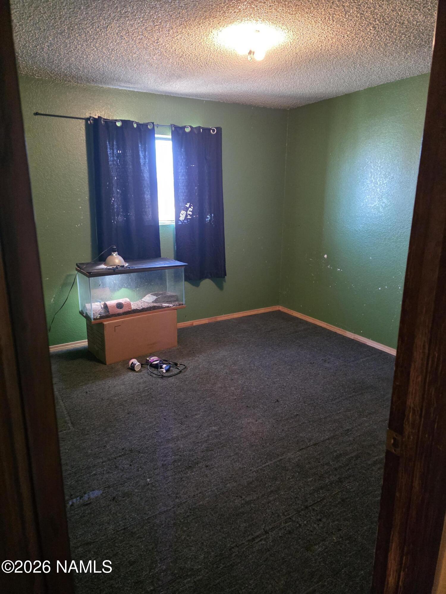 218 East Edison Avenue Williams, AZ 86046 - Photo 29 of 29 a room with furniture and window