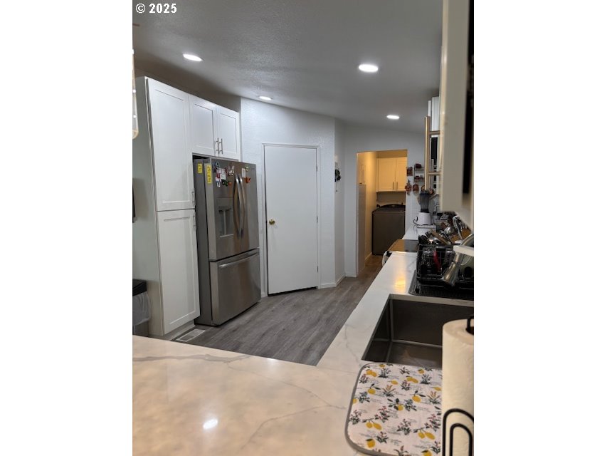5200 Southeast 132nd Avenue, Unit 12 Portland, OR 97236 - Photo 5 of 17 a living room with furniture and a rug