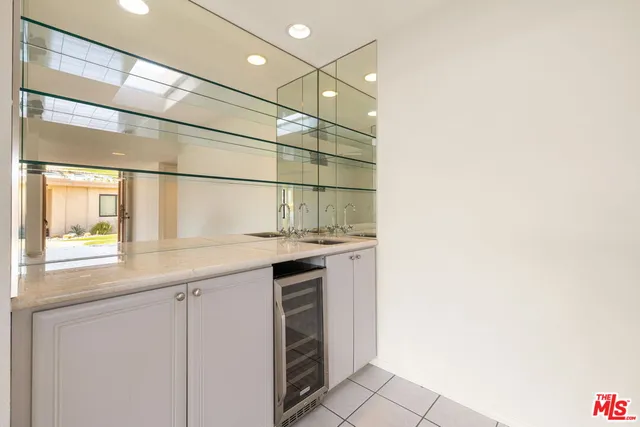 a bathroom with a sink and a window