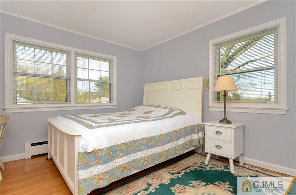 36 Harmony Road Randolph, NJ 07869 - Photo 11 of 22 a bedroom with a bed and a window