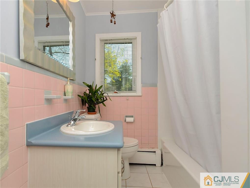 36 Harmony Road Randolph, NJ 07869 - Photo 13 of 22 a bathroom with a sink and a mirror
