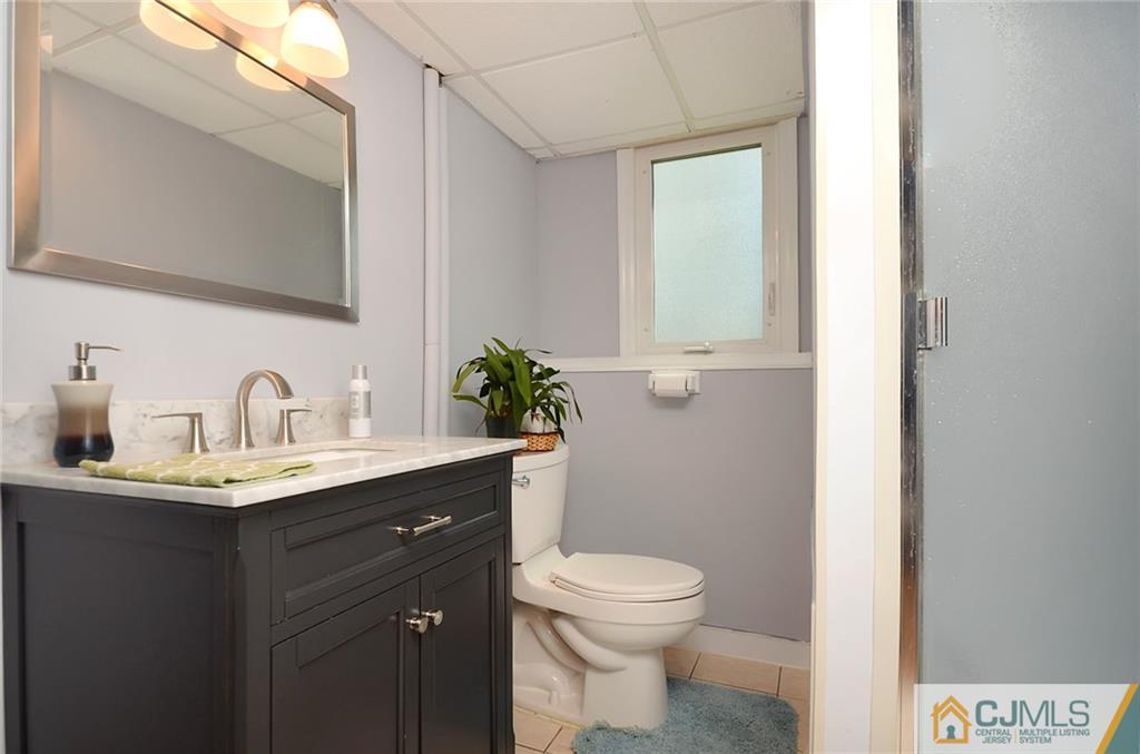 36 Harmony Road Randolph, NJ 07869 - Photo 16 of 22 a view of bathroom with a toilet sink and mirror