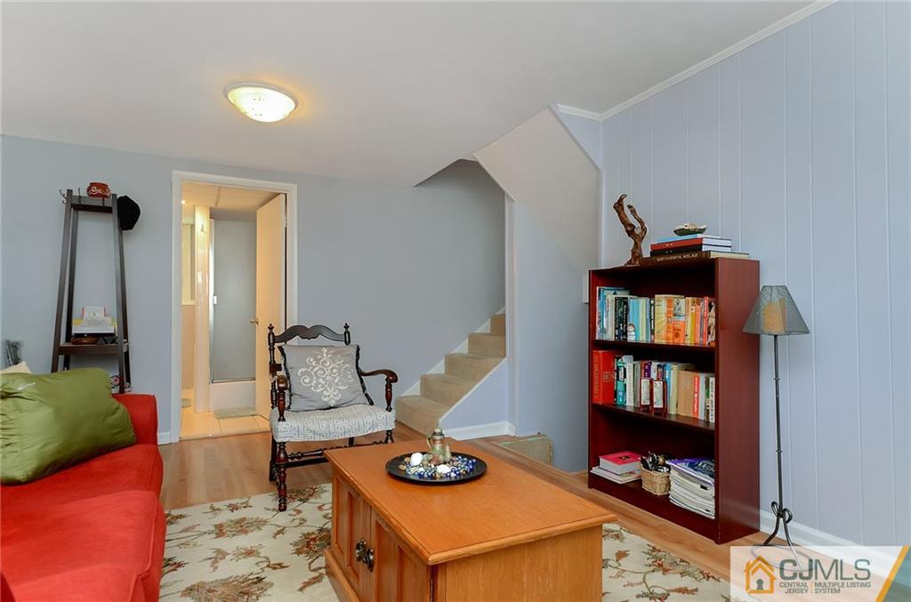 36 Harmony Road Randolph, NJ 07869 - Photo 18 of 22 a living room with furniture and a book shelf