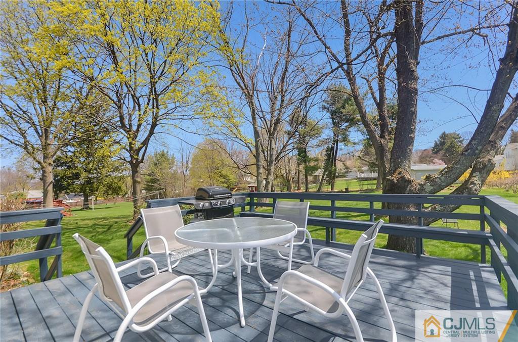 36 Harmony Road Randolph, NJ 07869 - Photo 19 of 22 a view of a chairs and table in a yard