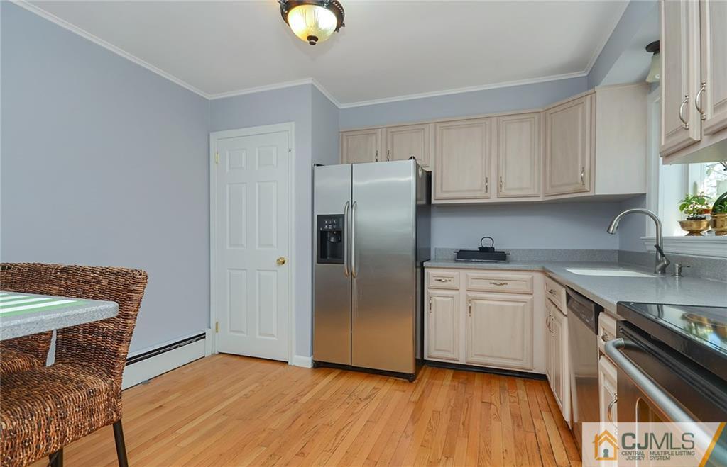 36 Harmony Road Randolph, NJ 07869 - Photo 8 of 22 a kitchen with stainless steel appliances granite countertop a refrigerator sink and cabinets