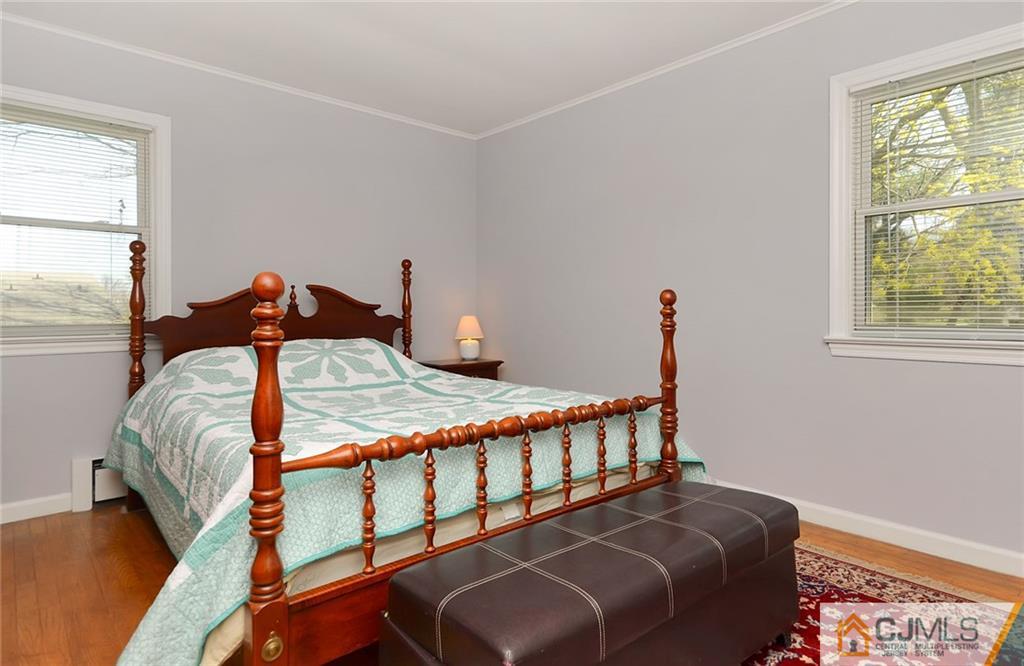 36 Harmony Road Randolph, NJ 07869 - Photo 10 of 22 a bedroom with a bed and a window