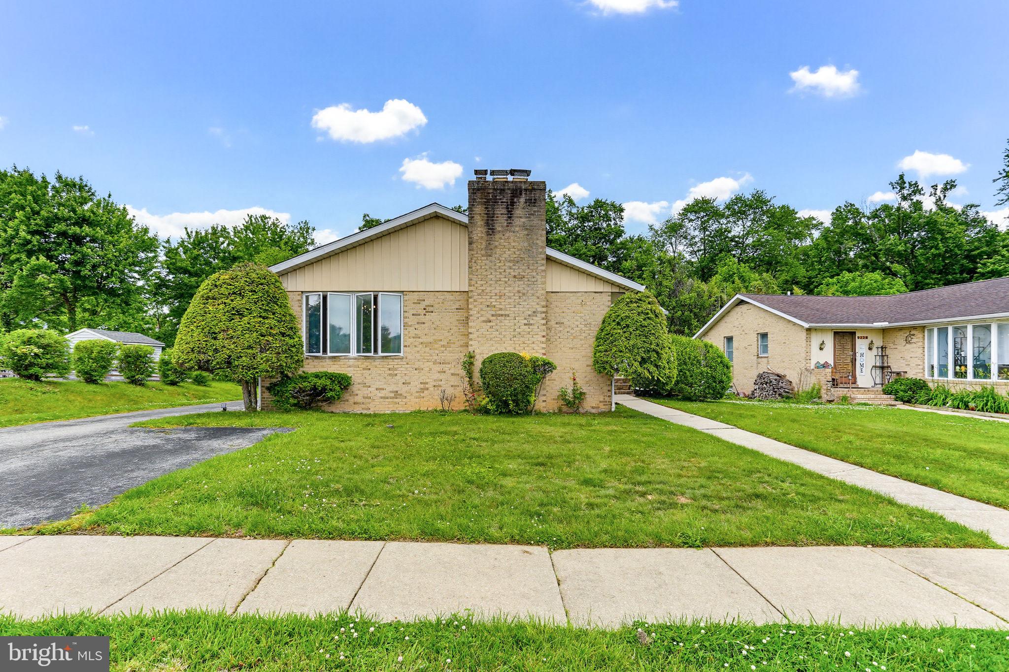 9301 Gardenia Road Baltimore, MD 21236 - Photo 1 of 37 a view of a house with a yard