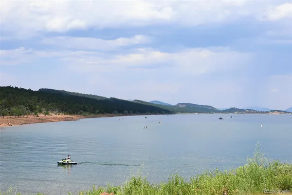 a view of lake with mountain
