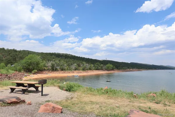 a view of lake with mountain