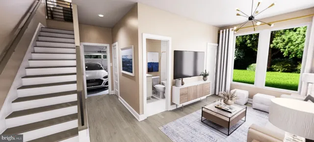 a living room with furniture and a floor to ceiling window