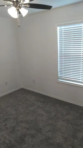 a view of a room with a window