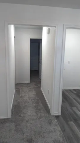 an empty room and closet area