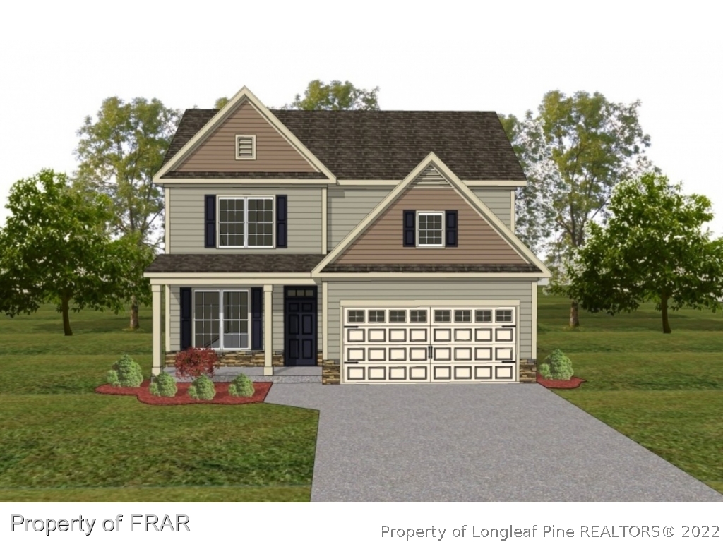 674 Stonebriar Avenue Raeford, NC 28376 - Photo 1 of 1 a front view of a house with a yard