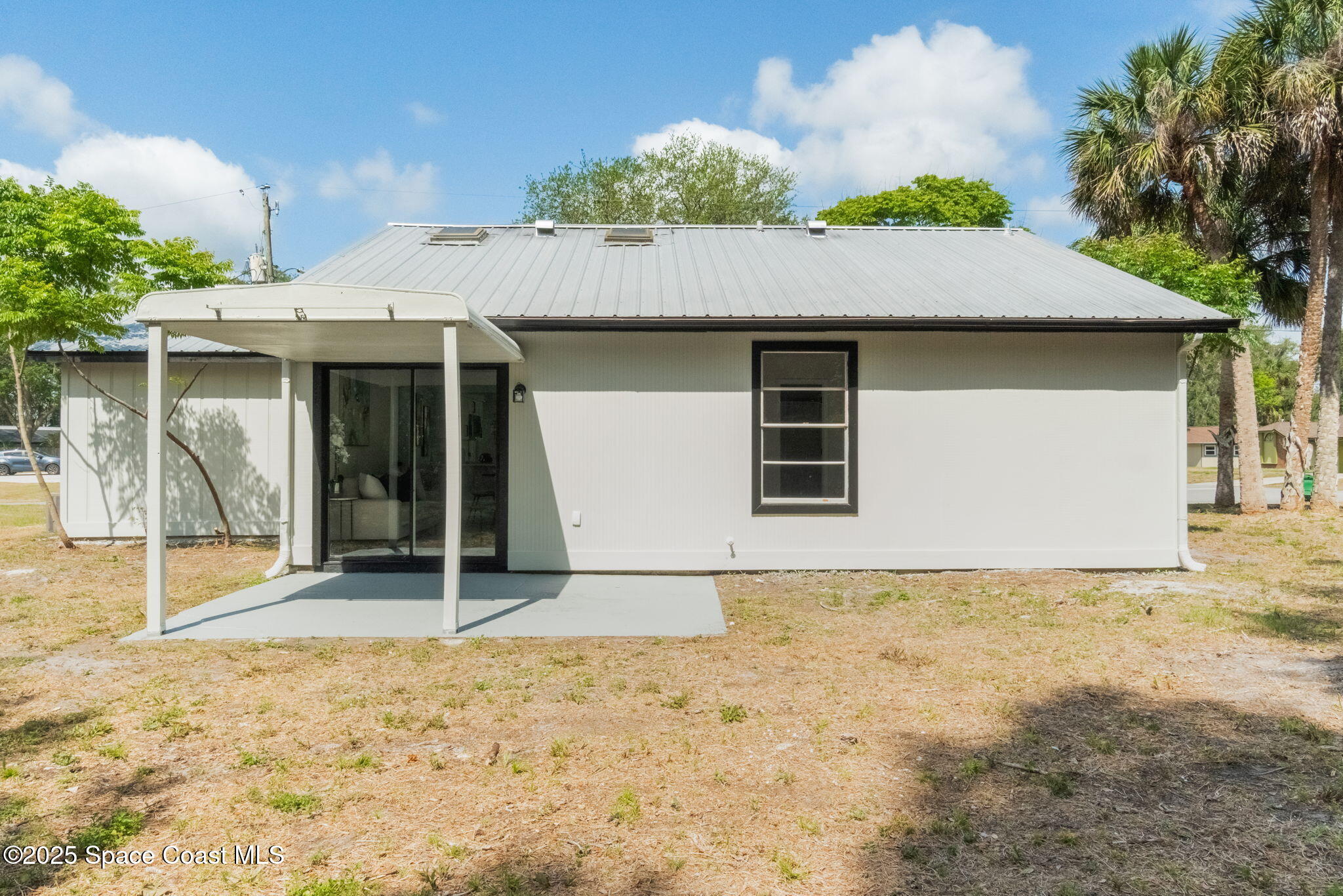 7115 Camilo Road Cocoa, FL 32927 - Photo 22 of 25 a house with a outdoor space