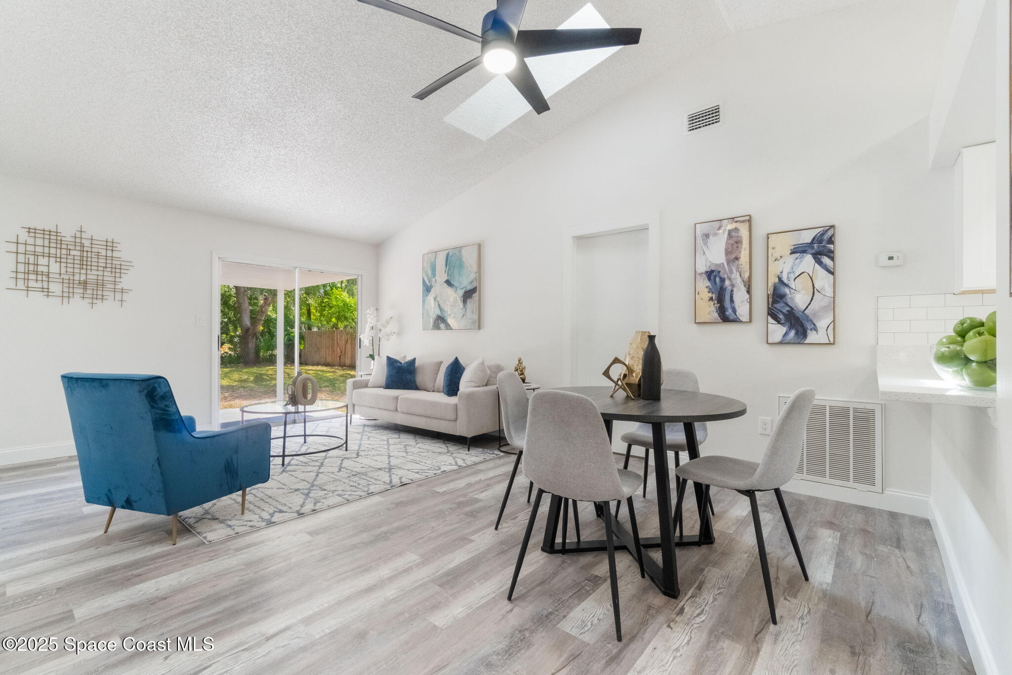 7115 Camilo Road Cocoa, FL 32927 - Photo 4 of 25 a view of a livingroom with furniture and a window