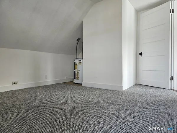 an empty room with a natural light